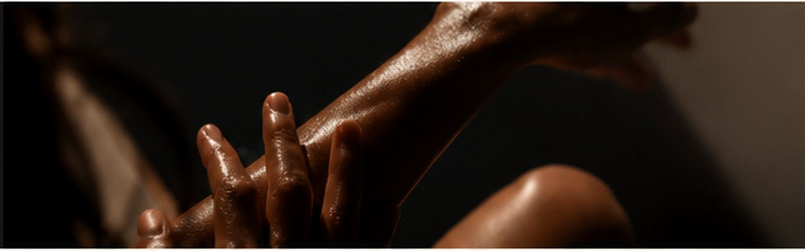 Moody editorial detail of luminous body skin